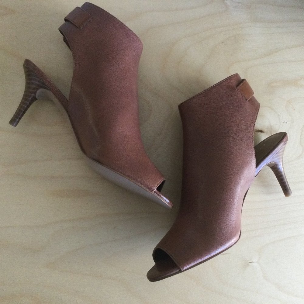 Coach Women's Marietta Burnish Calf turn lock Booties.